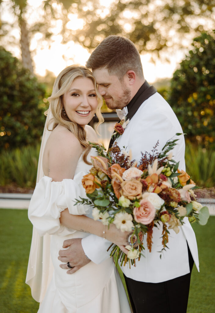 bride and groom hugging at a destination wedding venue Orlando