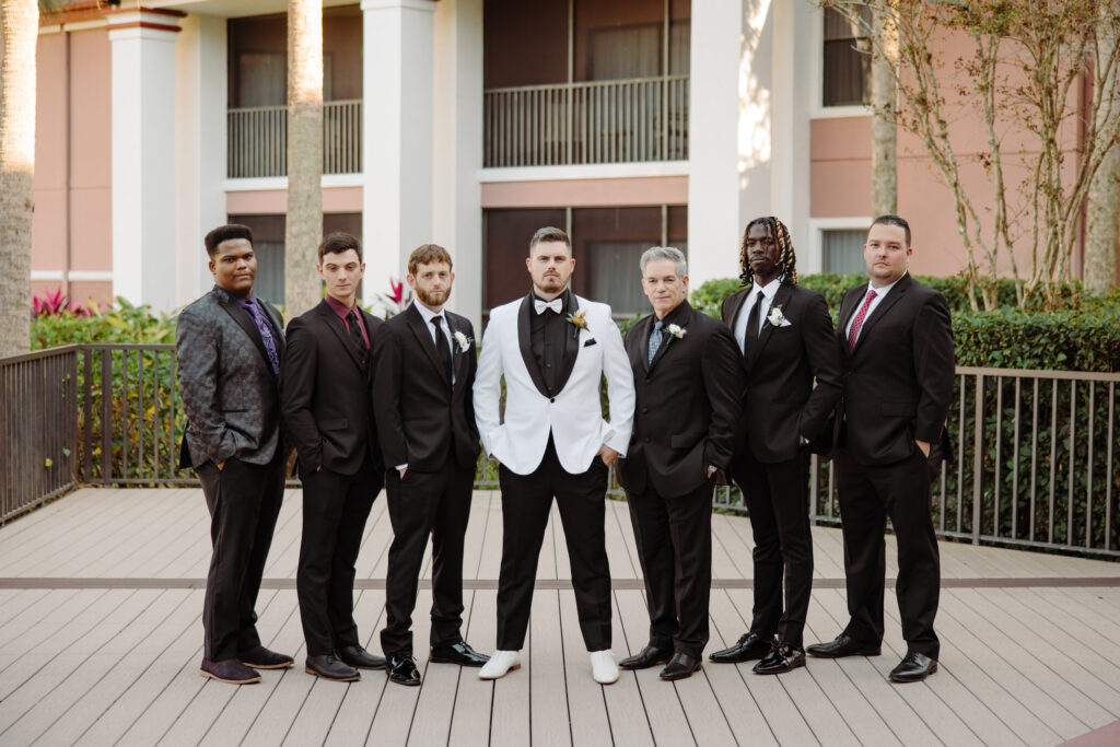 groomsmen wearing all black at a destination wedding venue Orlando