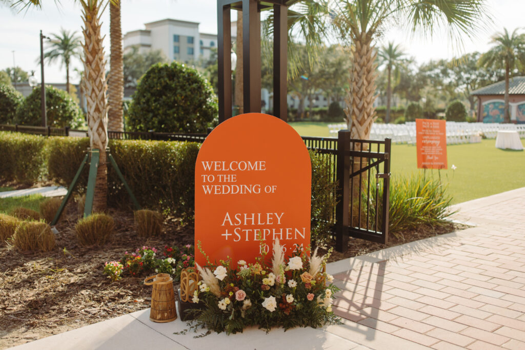 orange welcome to our wedding sign on Socialite Events Orlando