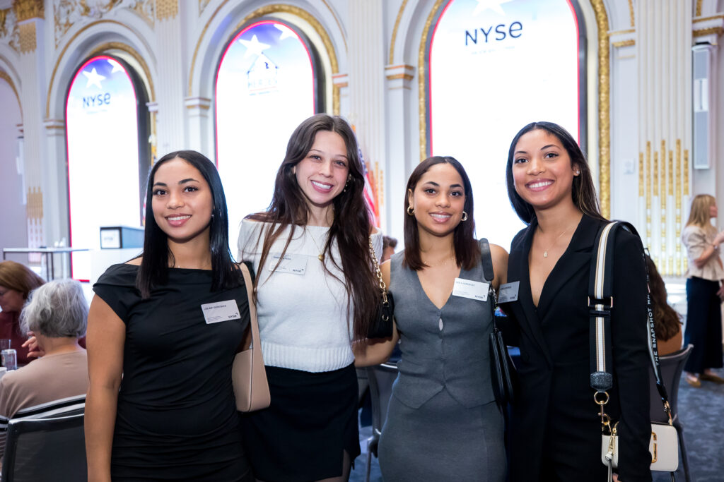 four women at a chairty event at NY Stock Exchange