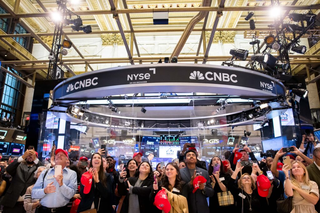 large group of people taking photos at the NYSE