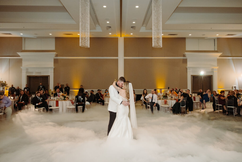 bride and groom dancing on a cloud at Caribe Royale Orlando