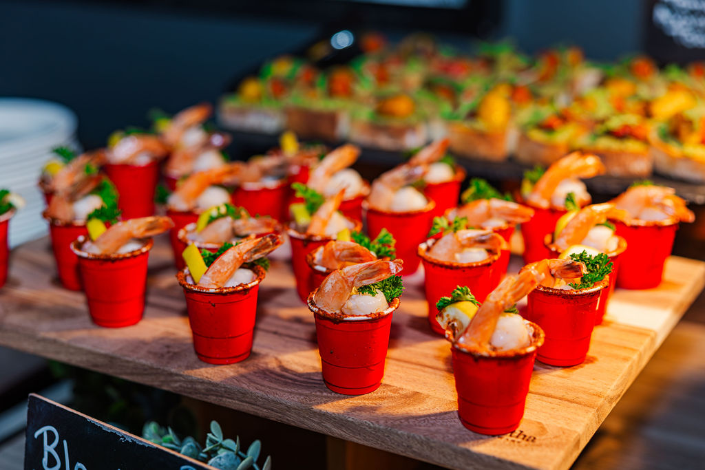 Mini shrimp cocktail cups for appetizers at an Orlando event planner coordinated event