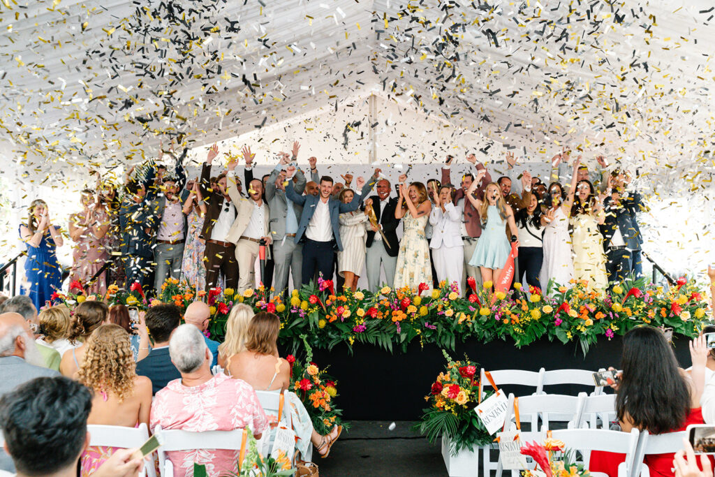 confetti explosion during ribbon cutting ceremony event planned by Socialite Event Planning