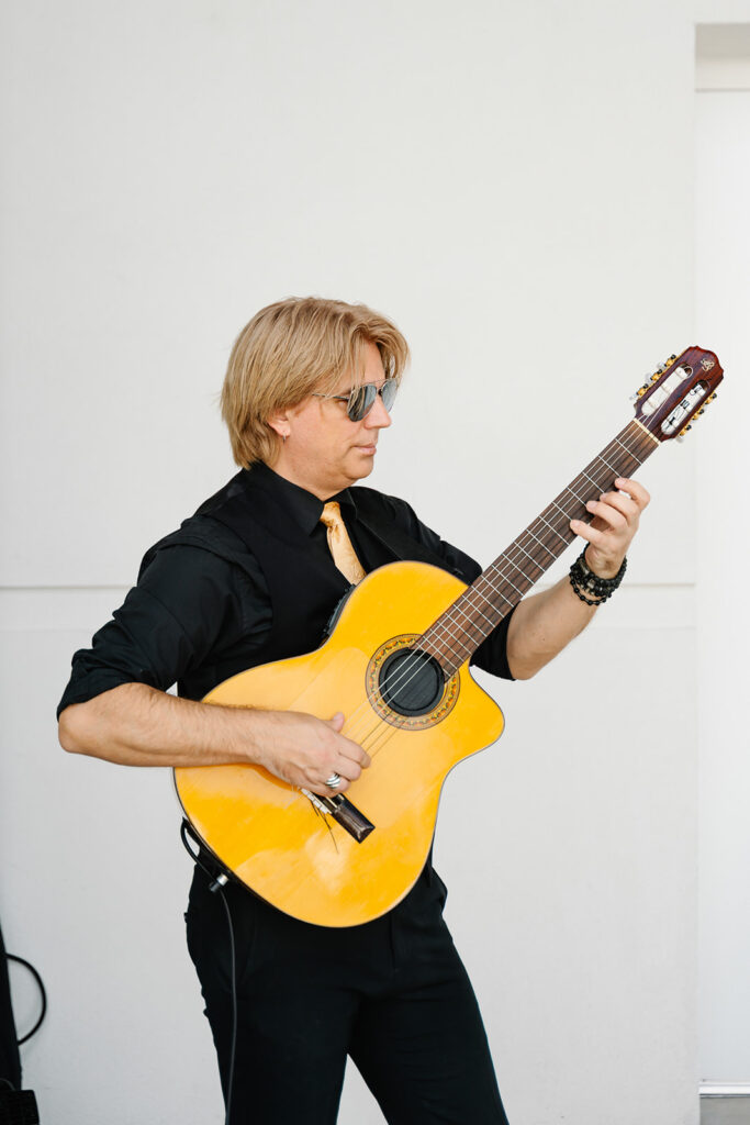 live guitarist performing at upscale corporate event in Orlando