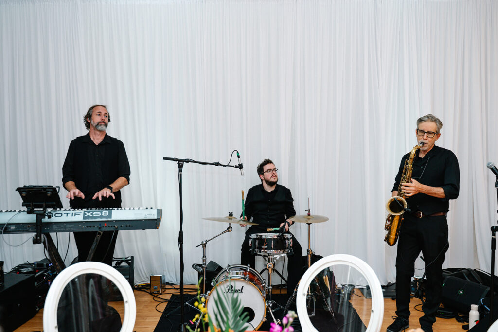 musicians entertain guests and create immersive experience at Orlando Corporate Event by Socialite Event Plannign