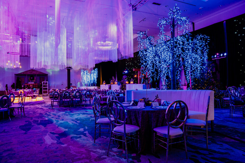 Moody purple and galaxy themed corporate holiday party